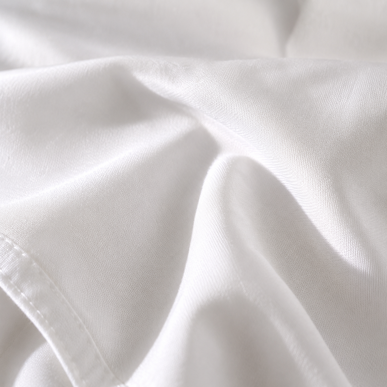 Detalle tejido Lyocell transpirable sábana bajera impermeable Somnilux